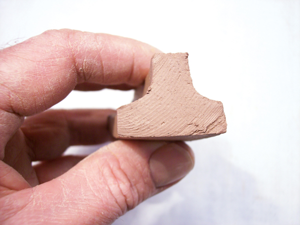 8 Use the T-shaped extrusion to create the house numbers.