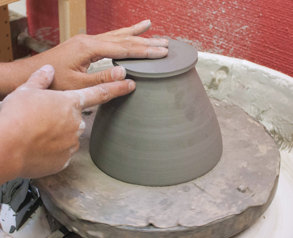 3 Center the bowl for trimming. I use a Xiem bat mat to hold the bowl in place.