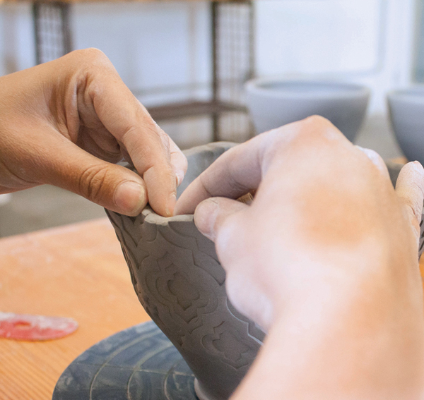 8 Use the stamps as a guide for spacing, press in with your thumbs and out with your index fingers to create a scalloped rim.