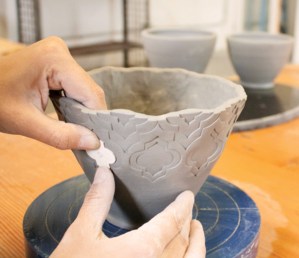 4 Add layers of depth with similar stamps of different sizes to create the desired layered effect.
