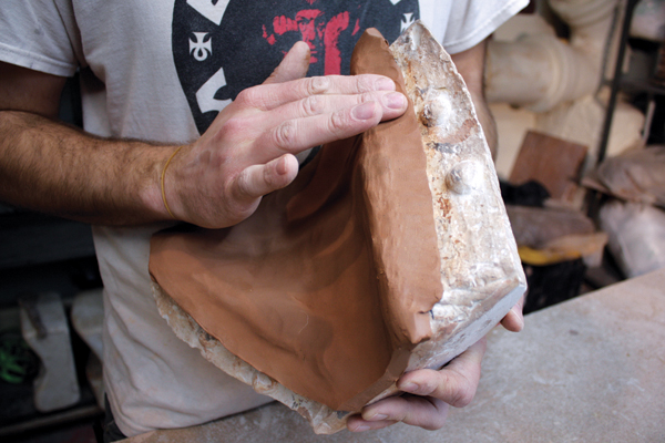 6 Press the edges of the slab to create thin joints.