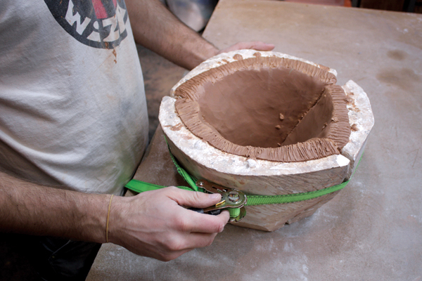7 Securing the top portion of the mold with ratchet straps maximizes compression.