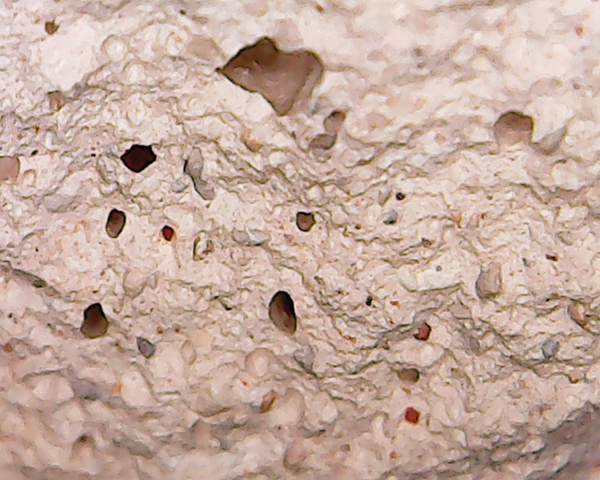 1 Large-particle fire clay at 200x magnification. 20–100 mesh plainly visible. The SSA formulation uses increasingly finer particles to fill the voids created by large-mesh clay.