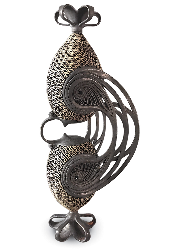 3 Couple, 35½ in. (90 cm) in height, wheel-thrown, handbuilt, and hand-carved white earthenware, fired to cone 04 reduction in a gas kiln. Photo: Mariam Stephan.