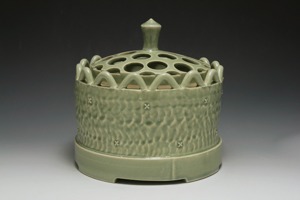 3 Brenda Quinn’s flower brick jar, 12 in. (30 cm) in width, handbuilt porcelain, fired to cone 6, 2017. Photo: Keith Renner.