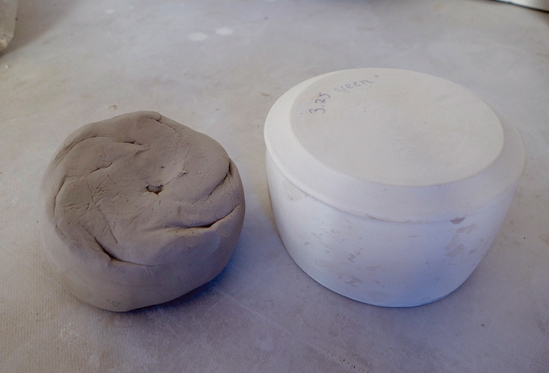 1 Bisque-fired template for the stand is on the right.
