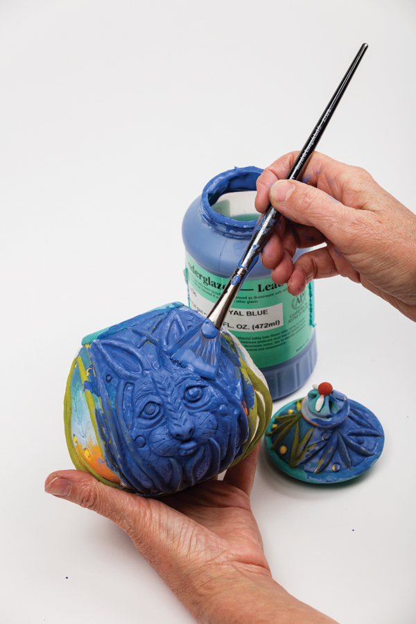 14 Apply one coat of underglaze to the exterior, making certain that the color flows into all low spots.