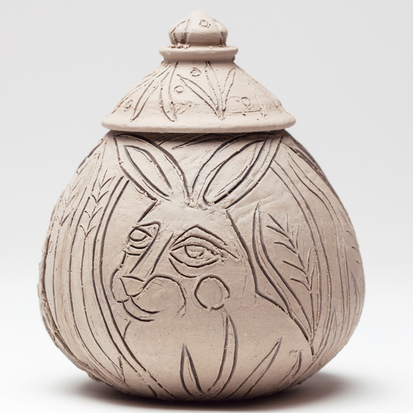 1 After you divide up your space (this pot was segmented into thirds), use a sharp pencil to lightly lay out your design.