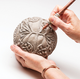 7 Include contrasting smooth areas, which are easily refined with a sgraffito tool, to create visual interest.