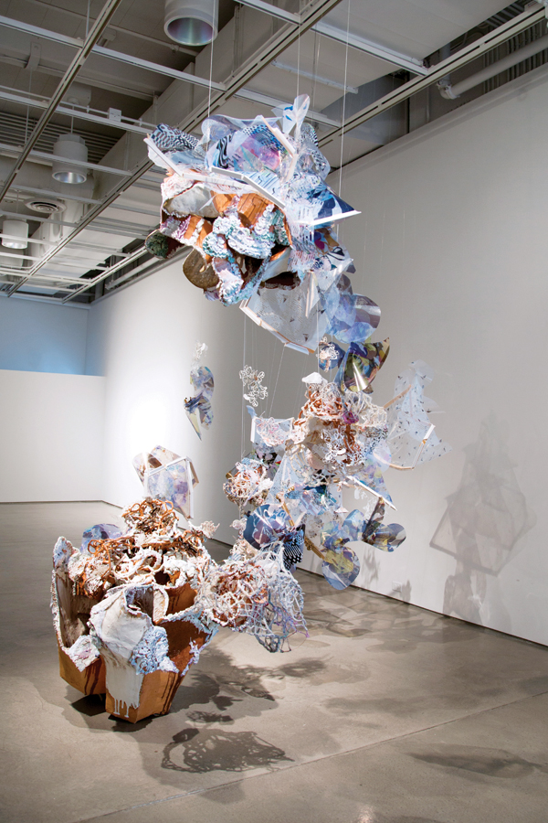 1 Shopping Spree Front View, 15 ft. (4.6 m) in height, terra cotta, cone 04 glaze, multiple firings, print on acetate film, yarn, wire, laser-cut paper, fishing line, 2017.