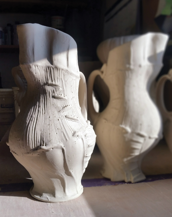 14 Slipped pitchers drying before being softly eroded to exaggerate the network of the crackles.