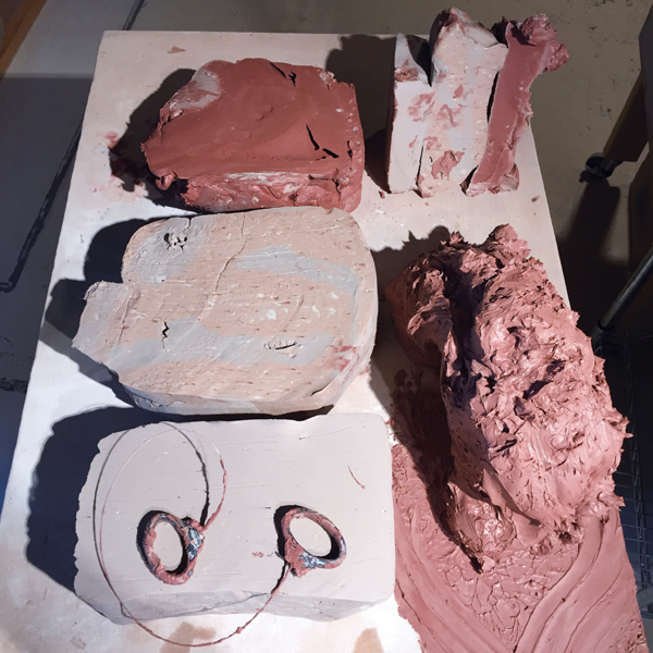 4 Clay and glaze waste are stored separately and then mixed together at a 1:1 ration by volume to create the paver mix. The paver mix is then pressed into the plaster molds, dried completely, and then fired stacked on their ends to cone 1. 