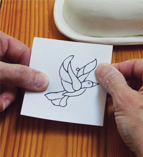 6 Print an image on paper and cut the excess paper from around the image.