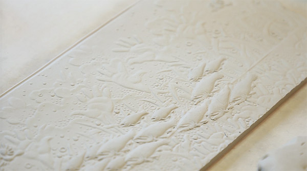 Slab with added sprigged texture.