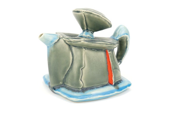 6 Chris Pickett’s teapot, 9 in. (23 cm) in width, handbuilt white stoneware, slab construction, drop molded, low-relief stencil, underglaze, glaze, fired to cone 6, 2017.