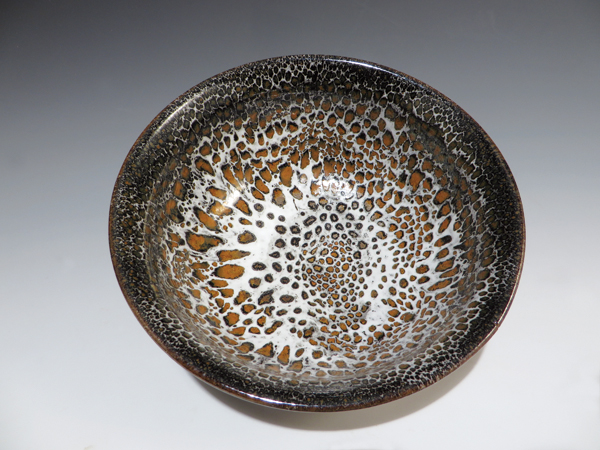 9 John Britt’s bowl, wheel thrown, oil-spot glaze. 