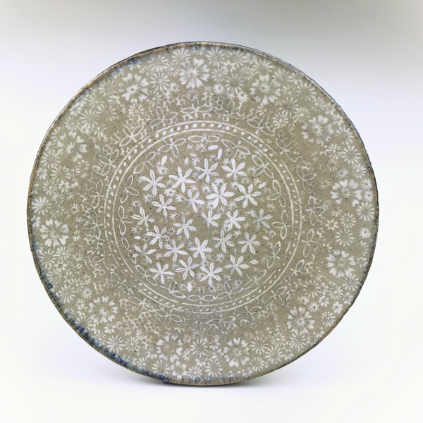 12 Michael Kline’s plate, stoneware, inlaid porcelain slip. 