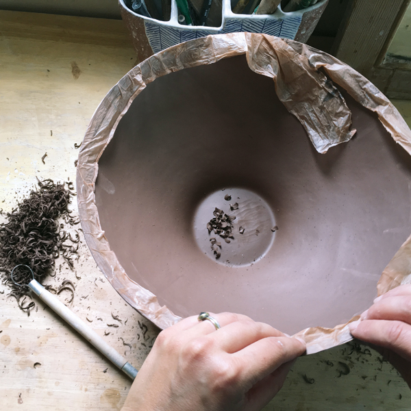 3 Wrap the rim of the cast piece in plastic strips to seal in the moisture when you’re not working on it.