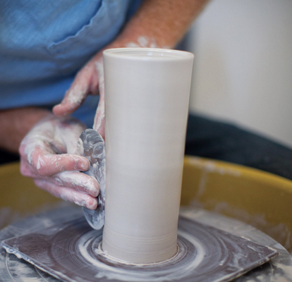 6 To achieve a smooth finish, rib the exterior of the tumbler with a metal rib.
