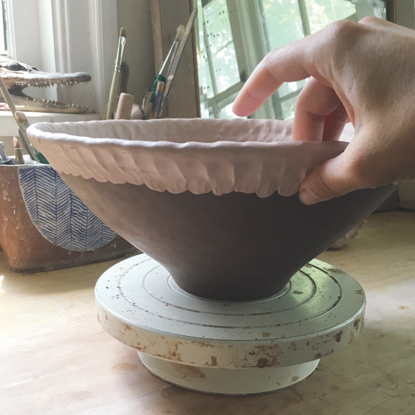 7 Pinch the section of overlap between the two clays to a ensure a uniform thickness.