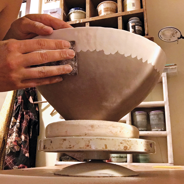 10 Sand the bone-dry bowl to smooth and clean up any smudges of one clay on the other.