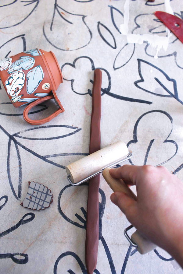 13 The double coil handle is flattened and widened with a wooden roller or brayer to a width that’s comfortable to hold.