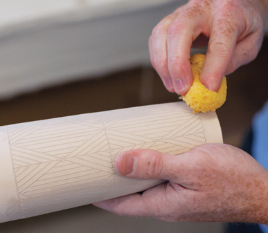 14 Once the glaze has dried, gently wipe off the excess.