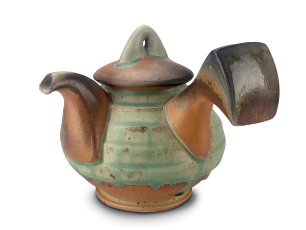 2 James Tingey’s teapot, 8 in. (20 cm) in length, white stoneware and porcelain, wood-soda fired to cone 11, 2018.