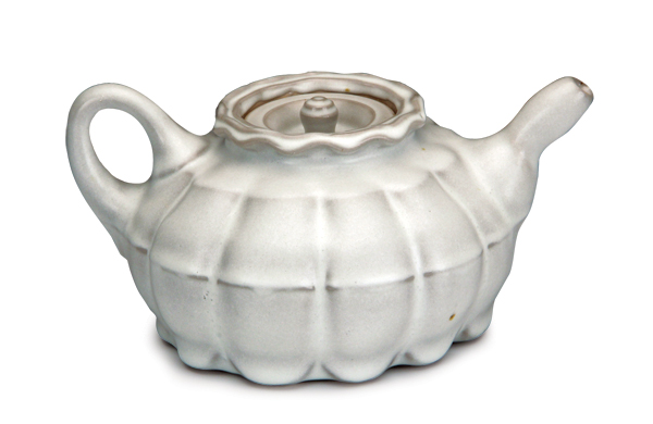 1 Tina Gebhart’s Cinderella Teapot, 9 in. (23 cm) in length, porcelain, fired to cone 10 in gas reduction, 2017.