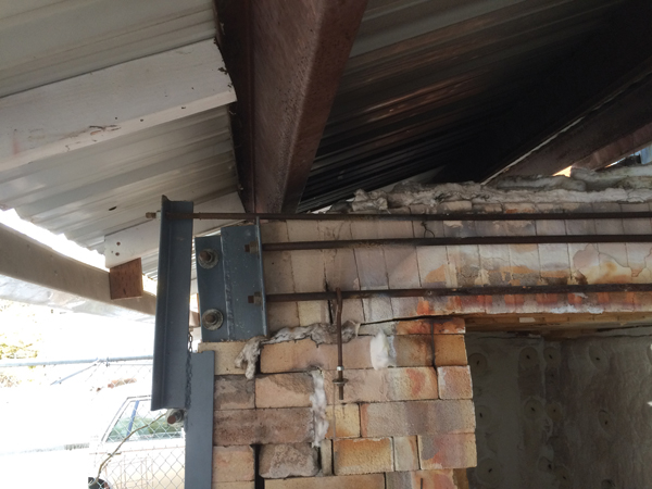 1 The face of the old roof that was exposed to the heat became brittle; particles and pieces of the brick fell on pots being fired.
