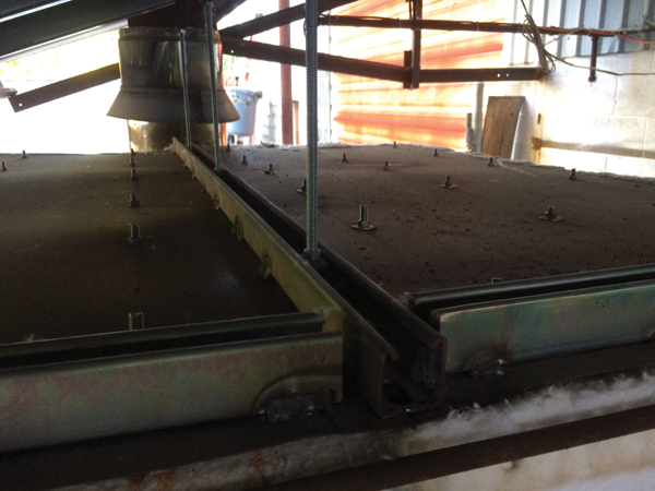 7 Top of roof plate showing bolts from Pyro-Blocs and centerline support rods. The centerline roof support system includes 3/8-inch all-thread rod located at three places along the Super Strut.
