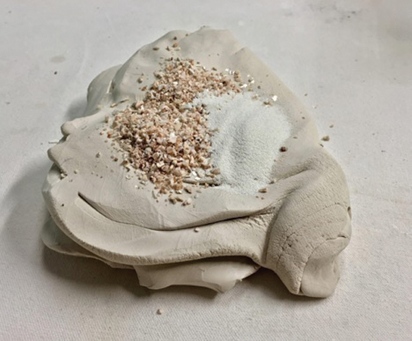 1 Porcelain with feldspar and molochite added before wedging. Hydrate the inclusions to prevent drying.