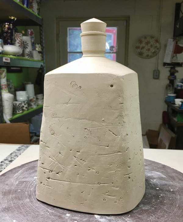 15 Use a Surform to create a seamless transition, add marks, then shape the stopper.