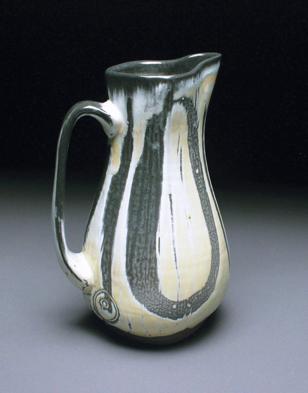 1 Lisa York’s pitcher, 11 in. (28 cm) in height, wheel-thrown and altered soda-fired ceramics, wax resist.