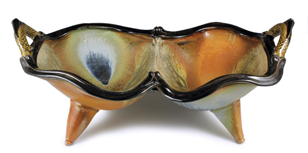 1 Steve Loucks’ Double Combo Bowl on Cones, 18 in. (46 cm) in length, wheel-thrown and assembled white stoneware, multiple layered glazes, fired to cone 10 in reduction, 2018. 