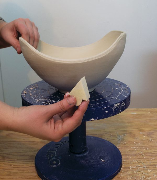5 Use a smooth, damp makeup sponge to compress and refine the cut edges.