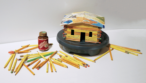 2 Richard Shaw’s House of Pencils on a Band Wheel, 13 in. (33 cm) in length, porcelain, glaze, overglaze transfers, 2014. 