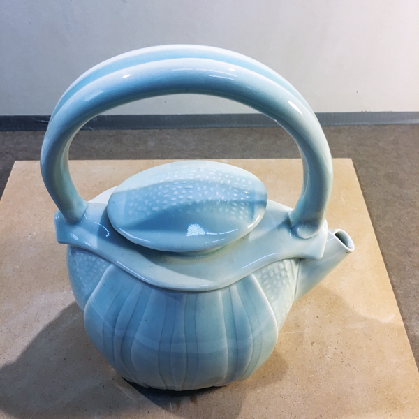 4D Teapot with indented coil handle.