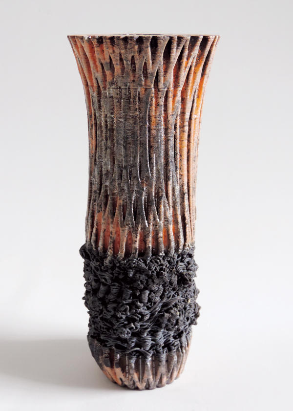 5 3D-printed ceramics, 7 in. (18 cm) in height, raku fired to 1832°F (1000°C).