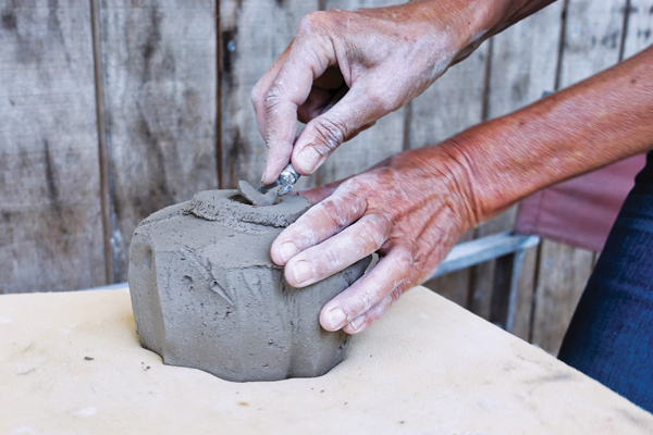 7 With the main form created, begin carving the foot of the bowl.