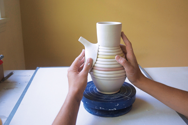 14 Score, slip, then gently compress the edges of the spout to the coils.