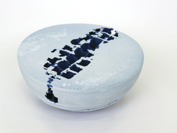 3 Quake, 7 in. (18 cm) in diameter, 3D-printed and hand-sculpted porcelain, colored blue clay, white engobe, fired to 2282°F (1250°C).