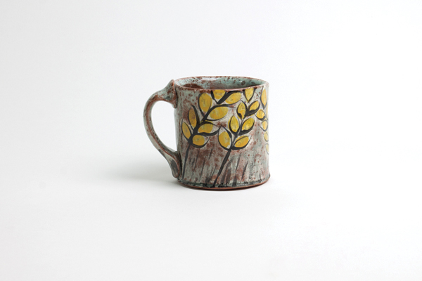 Mug, 4 in. (10 cm) in height, red earthenware, terra sigillata, slip, underglaze, glaze, fired to cone 03 in an electric kiln. Photo: Jacob Wiegmann.