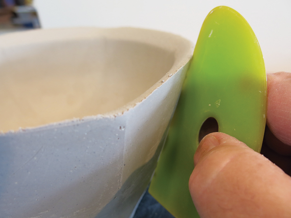 8 Smooth and burnish the facets using various rubber Mudtool ribs.