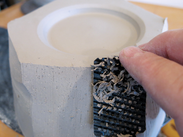 9 Rasp the foot, taking care not to trim the wall of the bowl too thin.