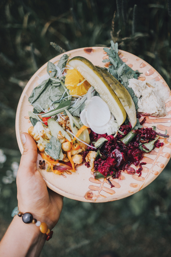 Plate heaped with fresh local produce prepared by Watershed’s chefs.
