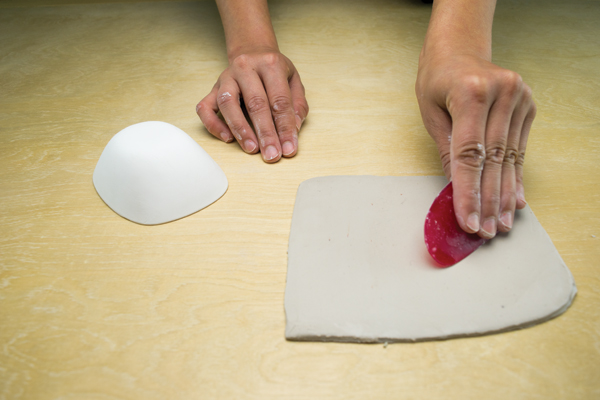4 Smooth a ¼-inch-thick slab, then form it over the milk-bowl hump mold (left).