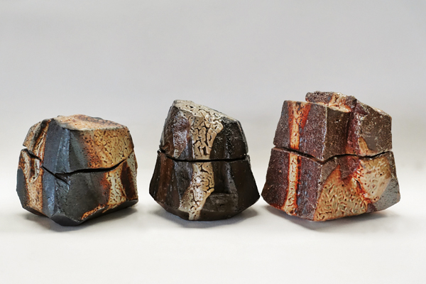 1 Three faceted shino boxes, 4 in. (10 cm) in height, wood-fired stoneware, fired to cone 10, 2017.