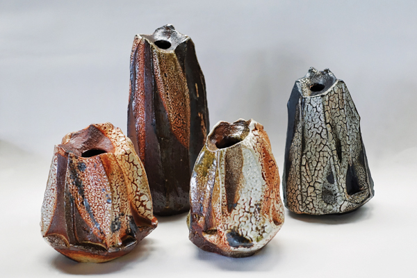 5 Four faceted shino vases, to 11 in. (28 cm) in height, wood-fired stoneware, fired to cone 10, 2017.