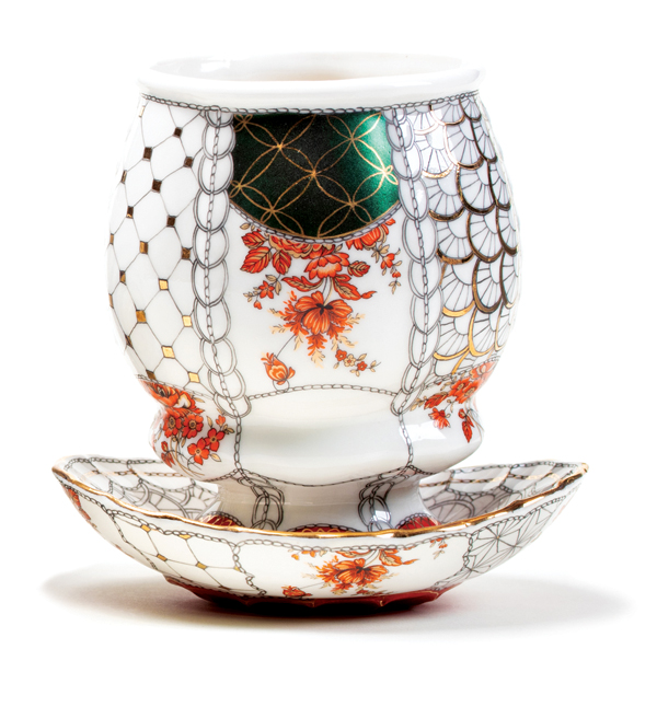 2 Melanie Sherman’s cup and saucer, to 5 in. (13 cm) in width, wheel-thrown porcelain, glaze, lusters, decals, fired multiple times at multiple temperatures from cone 10–017. 